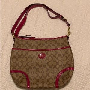 COACH - Leather canvas with magenta straps.